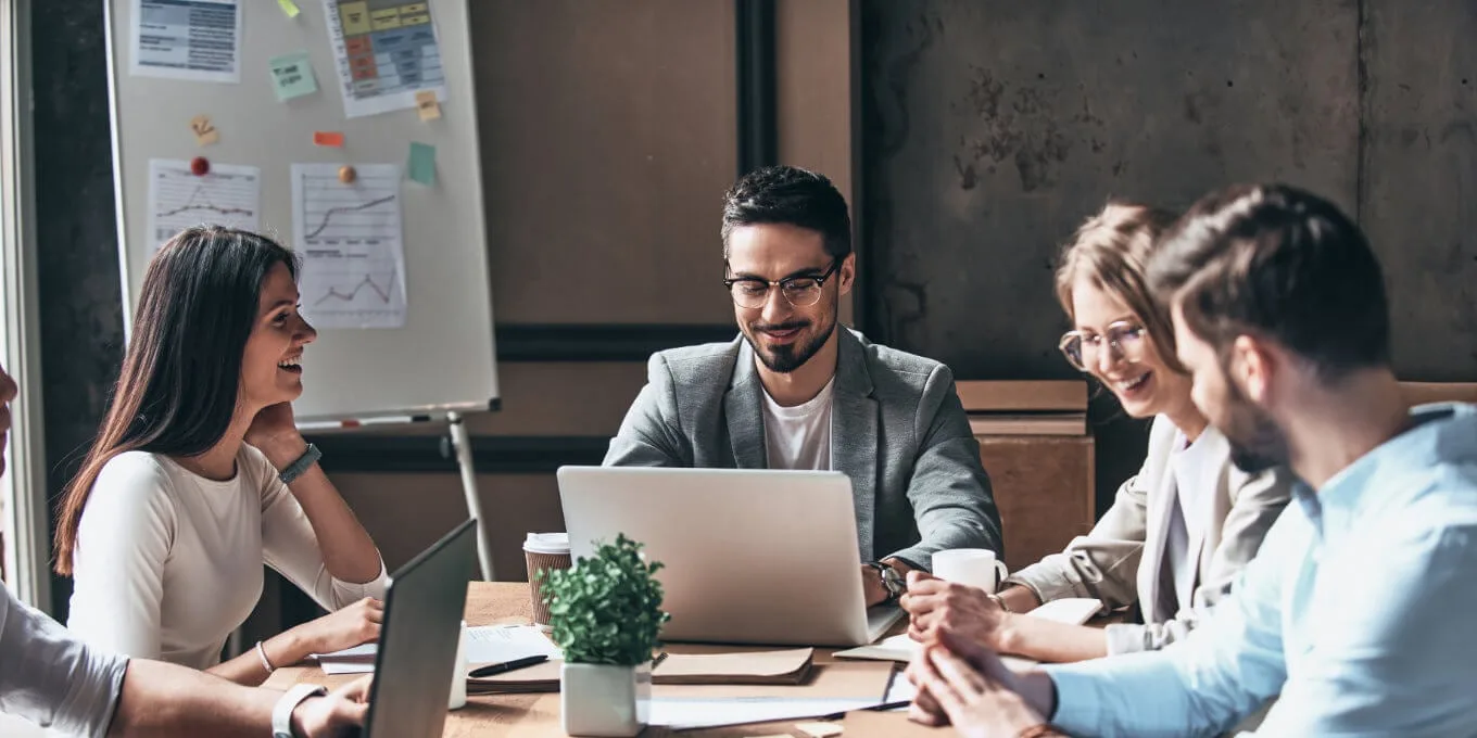 Team working together at a laptop
